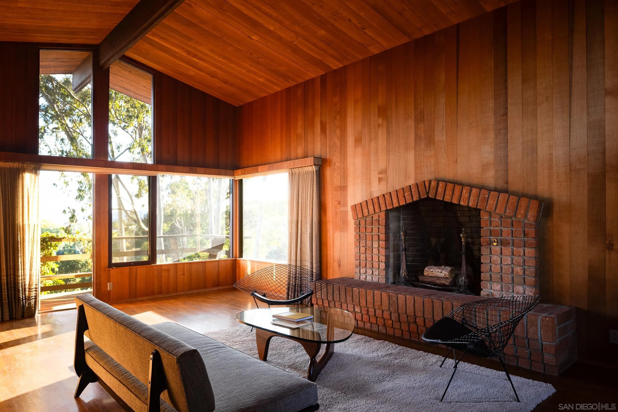 2411 Canyon Road Escondido, CA 92025 - Photo 15 of 41 a living room with furniture and a fireplace