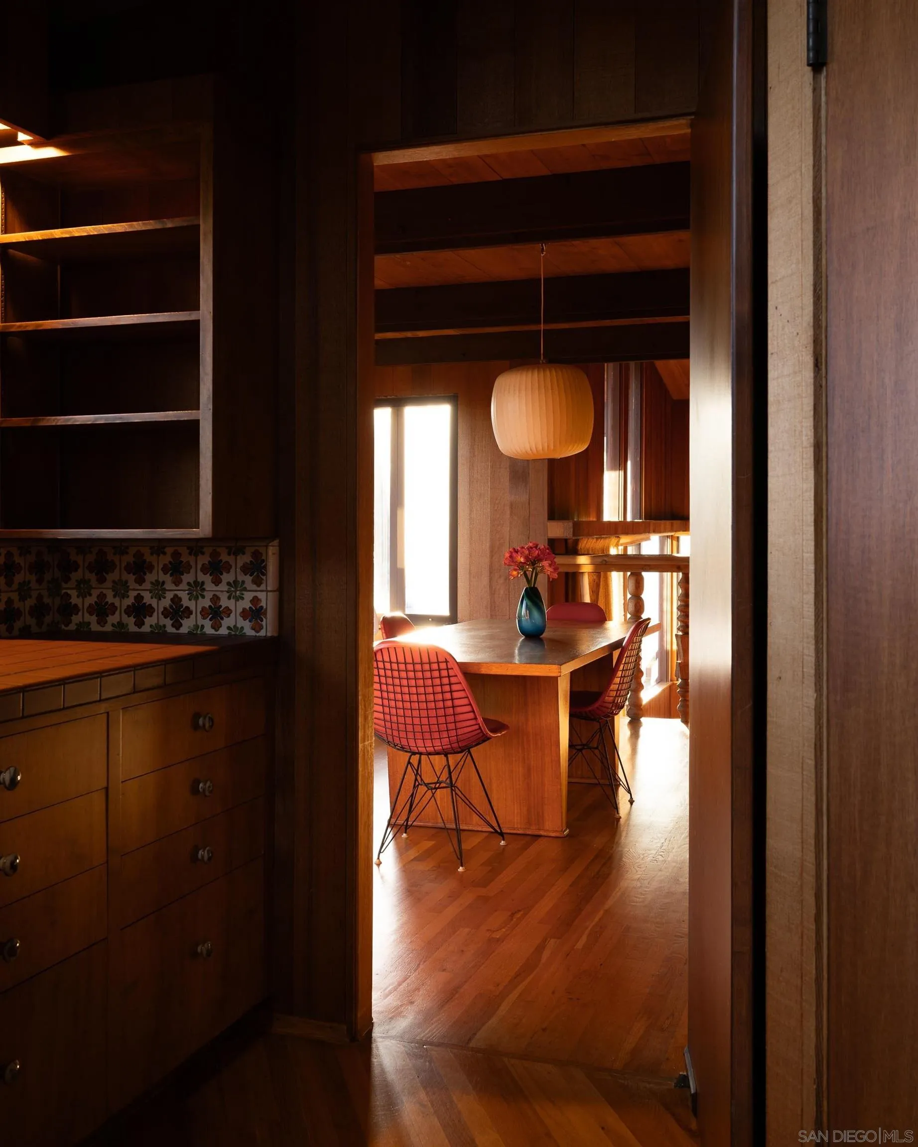 2411 Canyon Road Escondido, CA 92025 - Photo 19 of 41 a view of dining room with wooden floor and dining table
