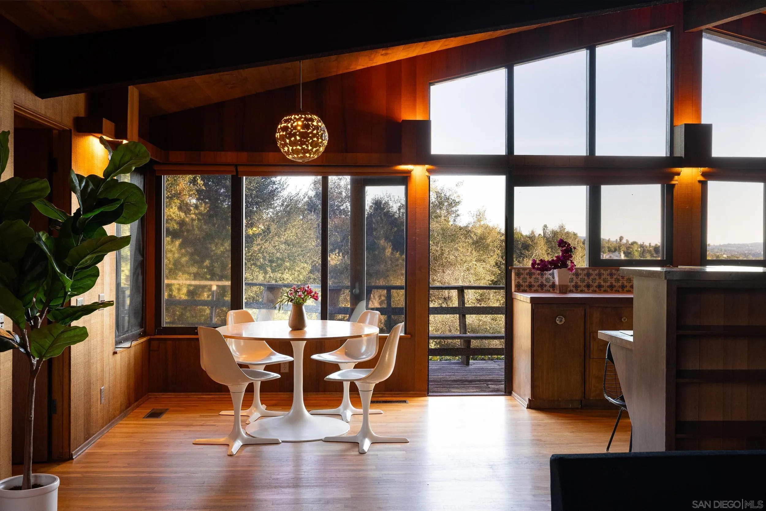 2411 Canyon Road Escondido, CA 92025 - Photo 20 of 41 a view of a dining room with furniture window and wooden floor