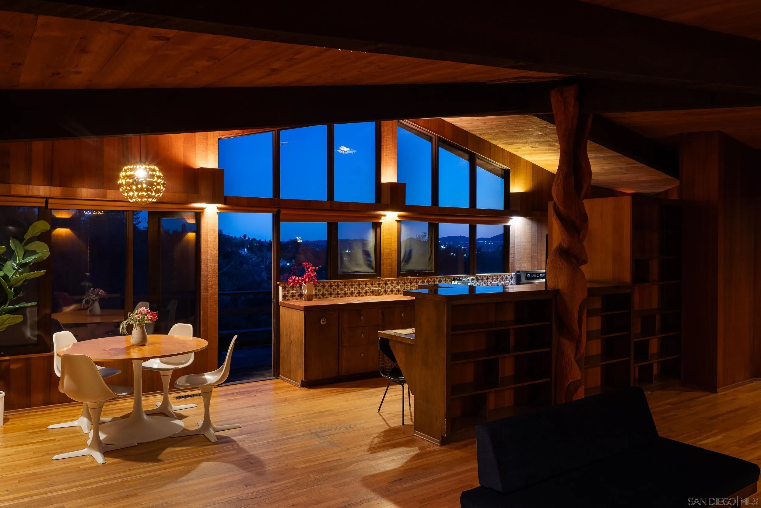 2411 Canyon Road Escondido, CA 92025 - Photo 21 of 41 a view of a patio with table and chairs and potted plants