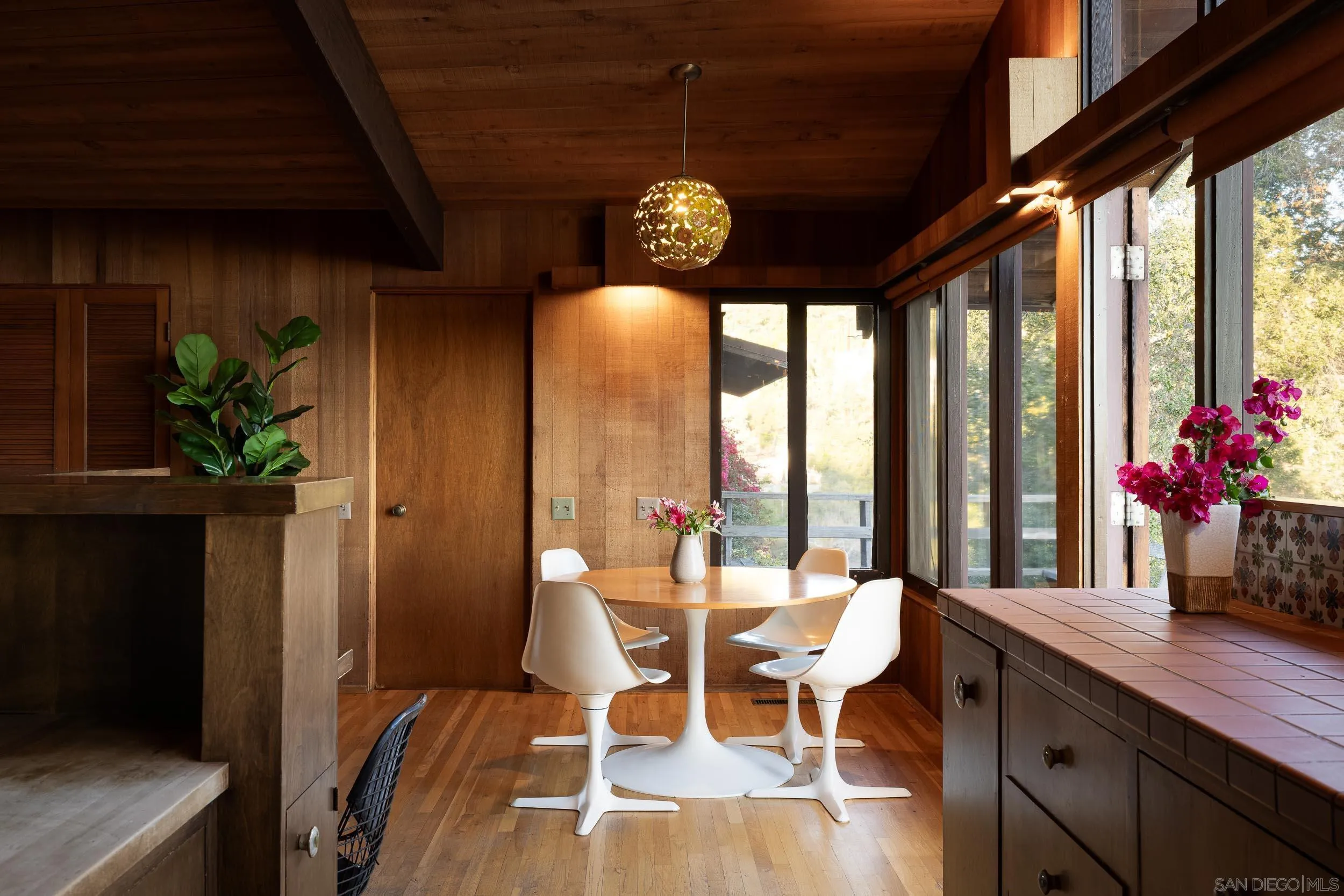 2411 Canyon Road Escondido, CA 92025 - Photo 22 of 41 a view of a dining room with furniture window and outside view