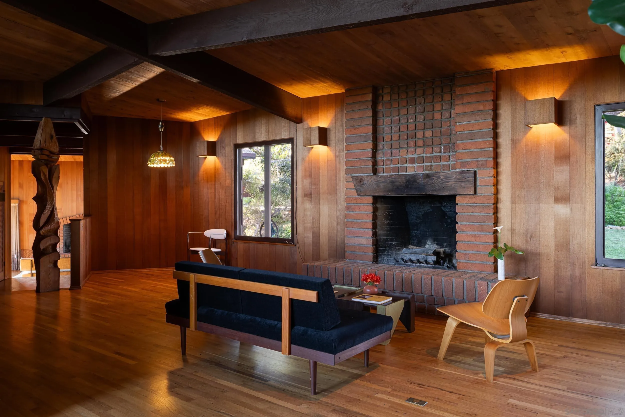 2411 Canyon Road Escondido, CA 92025 - Photo 23 of 41 a living room with furniture and a fireplace