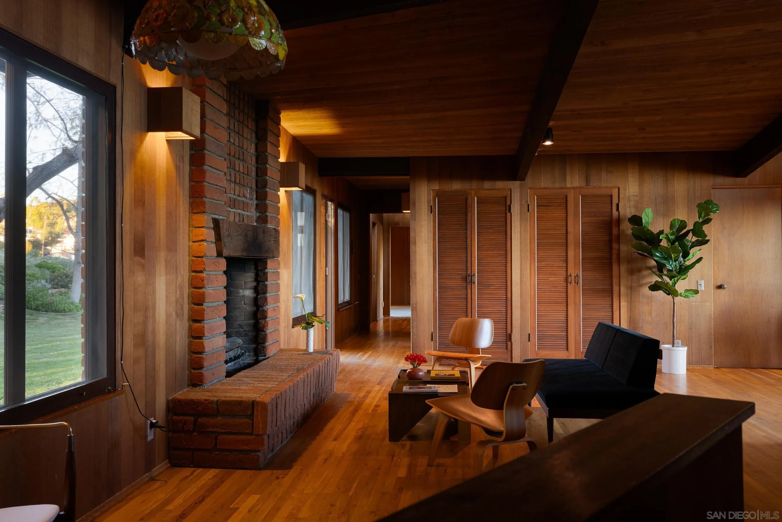 2411 Canyon Road Escondido, CA 92025 - Photo 26 of 41 a living room with furniture and a large window