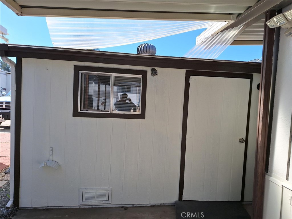 860 Birch Drive San Jacinto, CA 92583 - Photo 11 of 16 a view of a door and a window