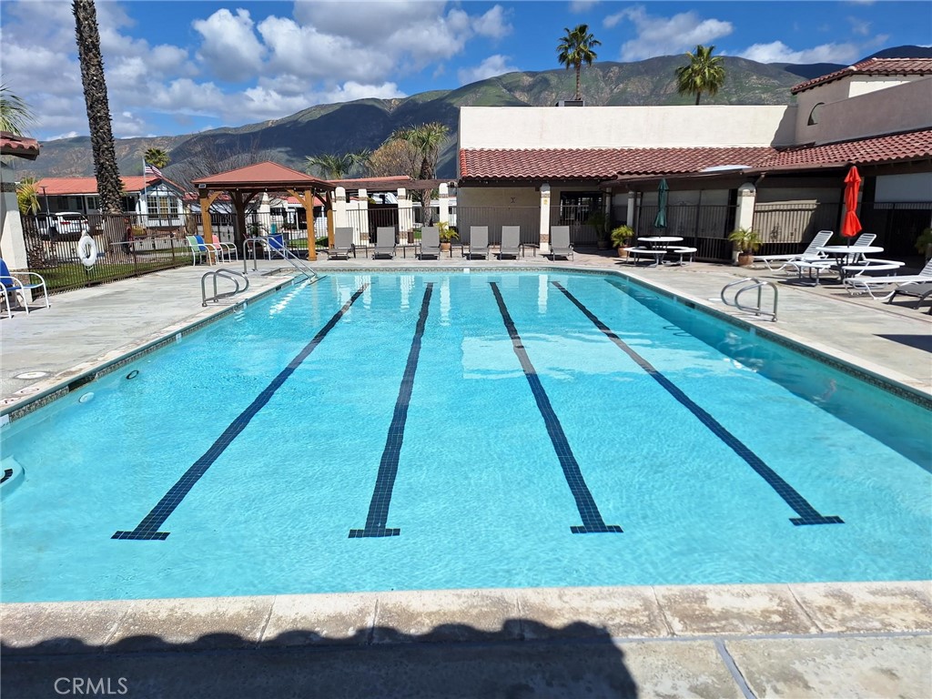 860 Birch Drive San Jacinto, CA 92583 - Photo 16 of 16 a view of a swimming pool with a patio