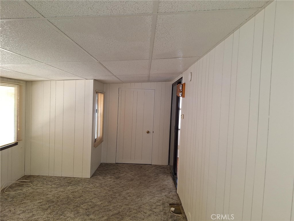 860 Birch Drive San Jacinto, CA 92583 - Photo 4 of 16 a view of hallway with window