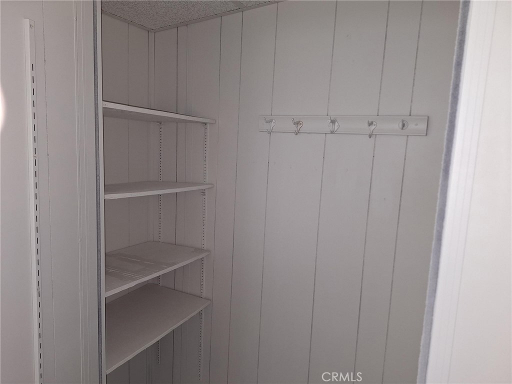 860 Birch Drive San Jacinto, CA 92583 - Photo 8 of 16 a view of an empty walk in closet