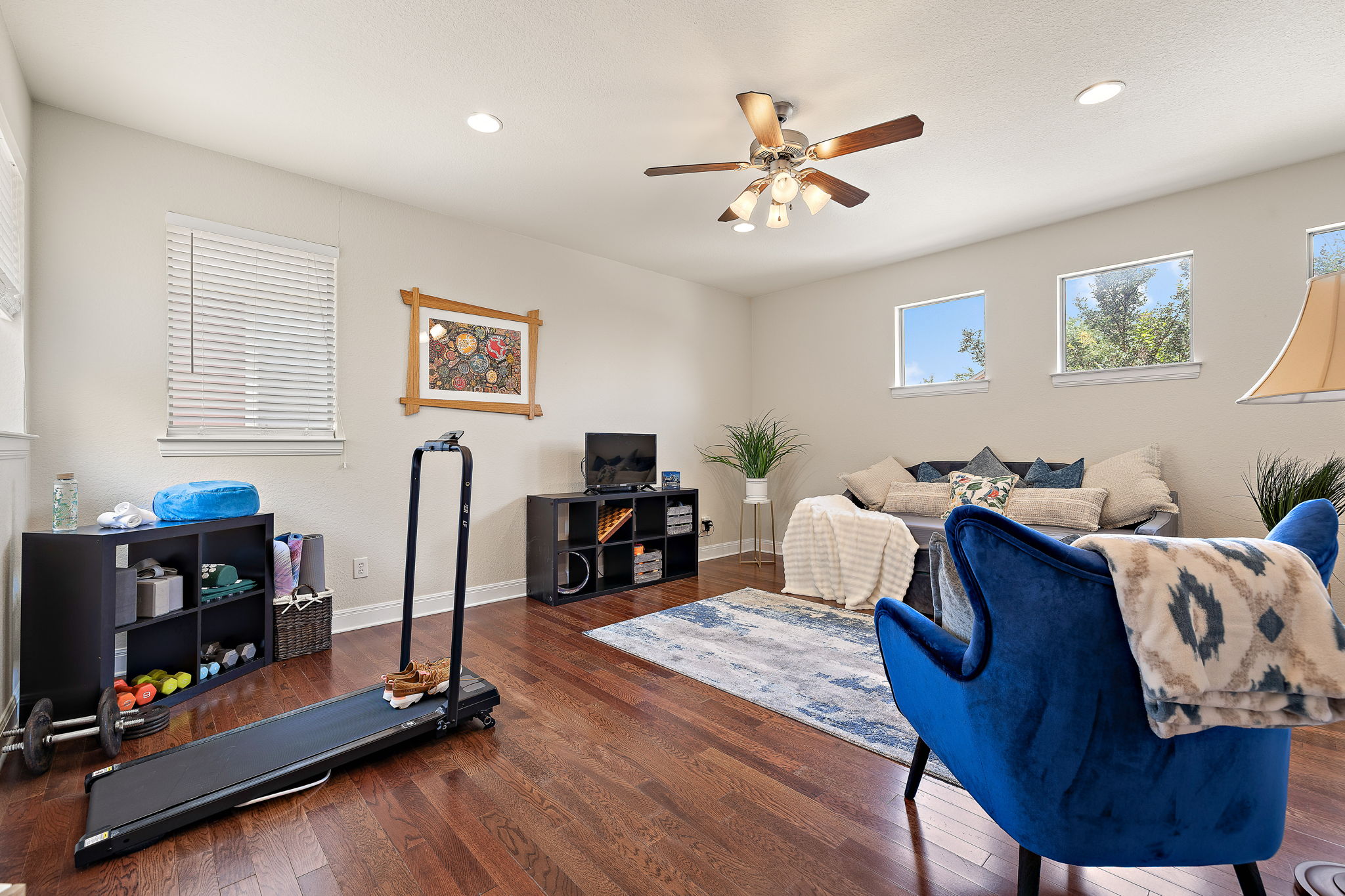 6708 Menchaca Road, Unit 10 Austin, TX 78745 - Photo 12 of 28 Spacious room featuring wood-finish flooring, recessed lighting, and multiple windows
