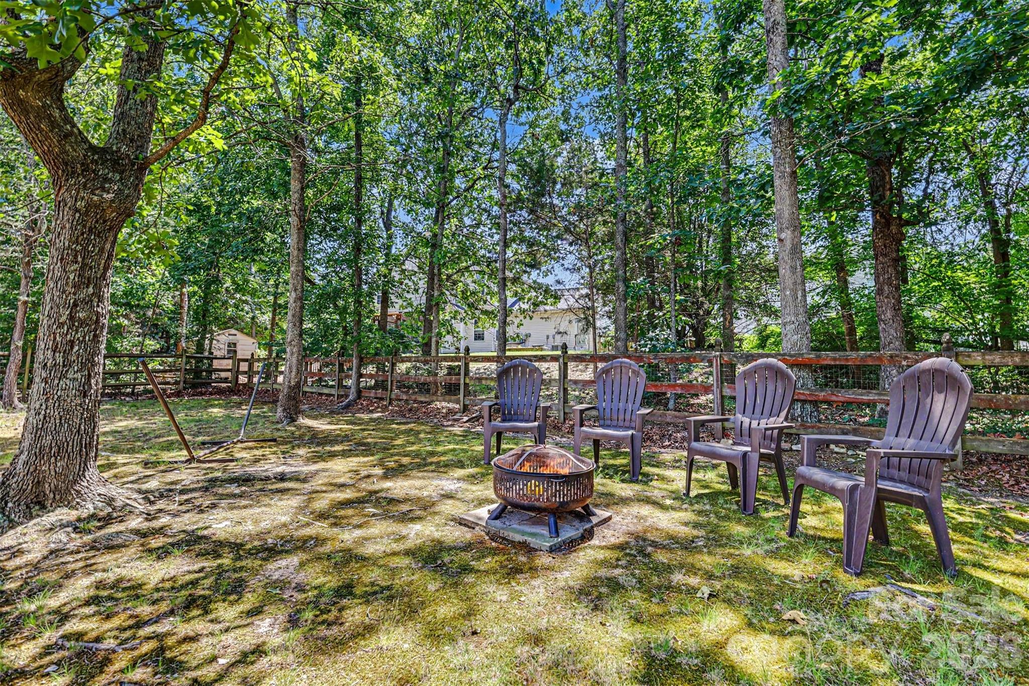 3035 Proverbs Court Monroe, NC 28110 - Photo 28 of 30 a view of a chairs and table in the patio