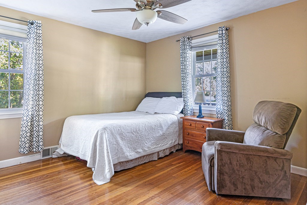 14 Hoover Road Northborough, MA 01532 - Photo 15 of 30 a bedroom with a bed and wooden floor