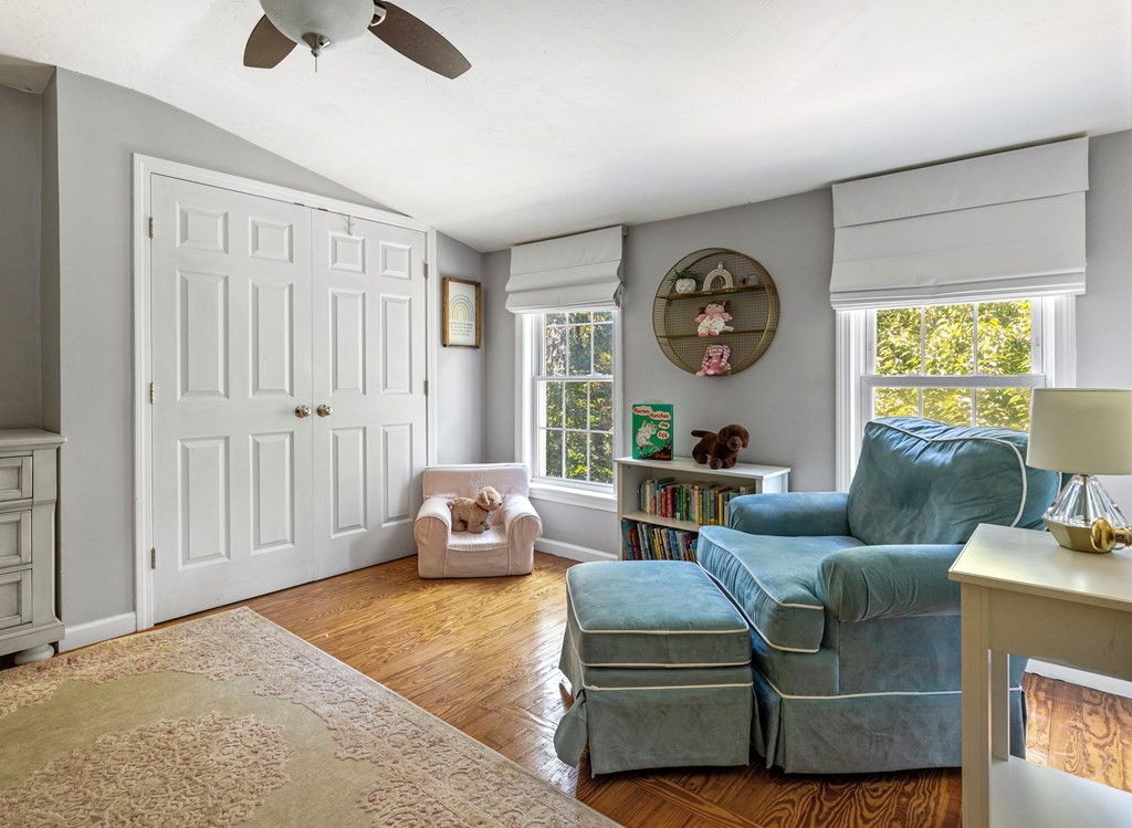 14 Hoover Road Northborough, MA 01532 - Photo 18 of 30 a living room with furniture a window and a chandelier