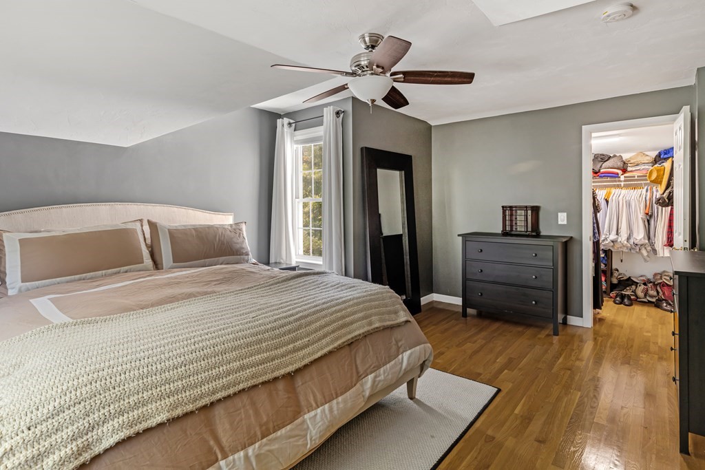 14 Hoover Road Northborough, MA 01532 - Photo 20 of 30 a bedroom with a bed and wooden floor