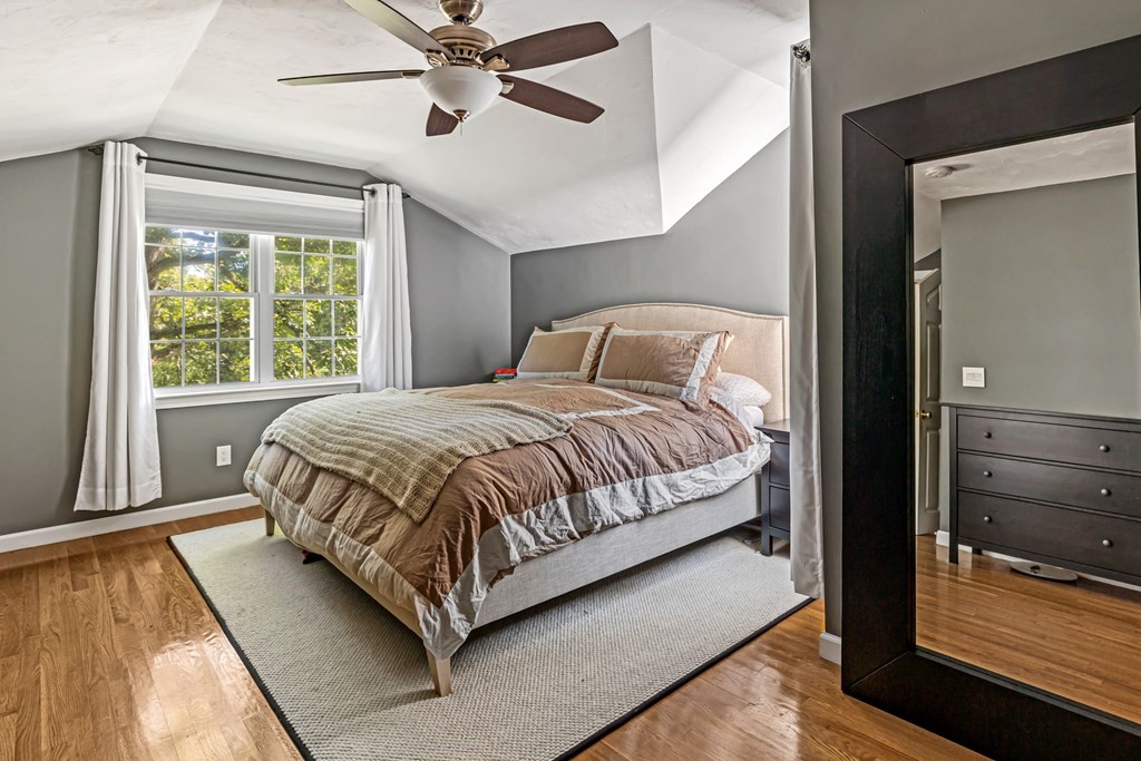 14 Hoover Road Northborough, MA 01532 - Photo 21 of 30 a bedroom with a bed lamp and window