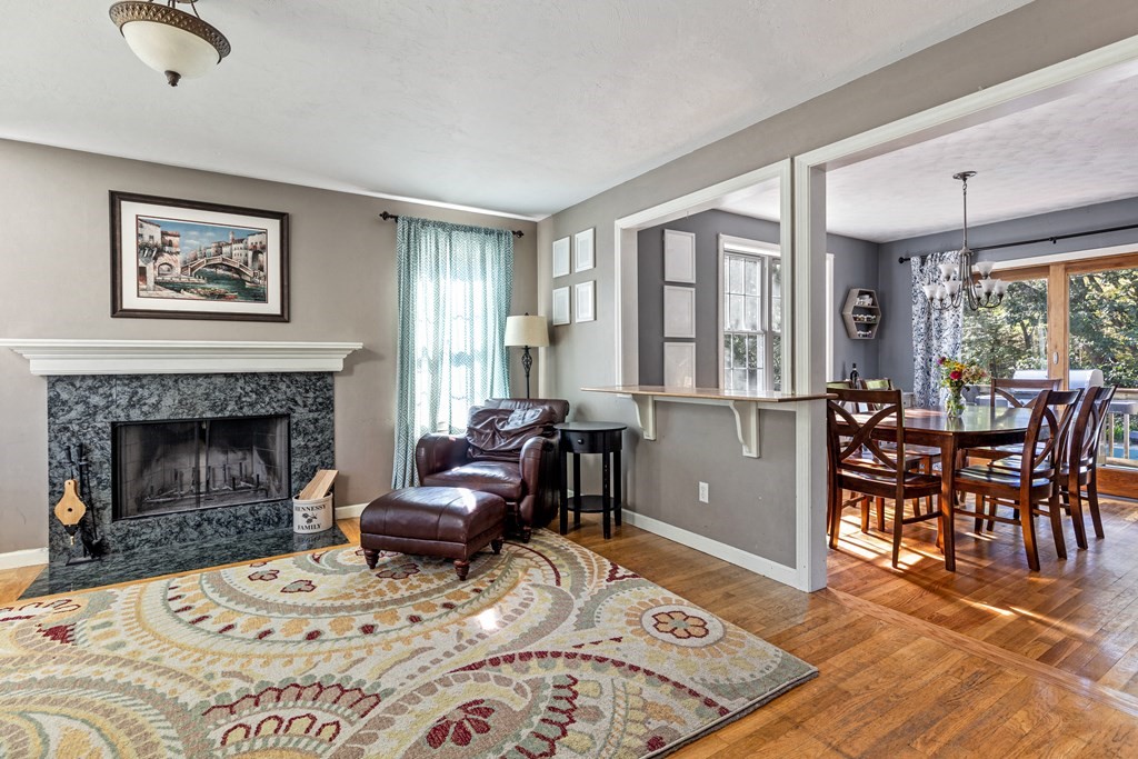 14 Hoover Road Northborough, MA 01532 - Photo 6 of 30 a living room with furniture and a fireplace