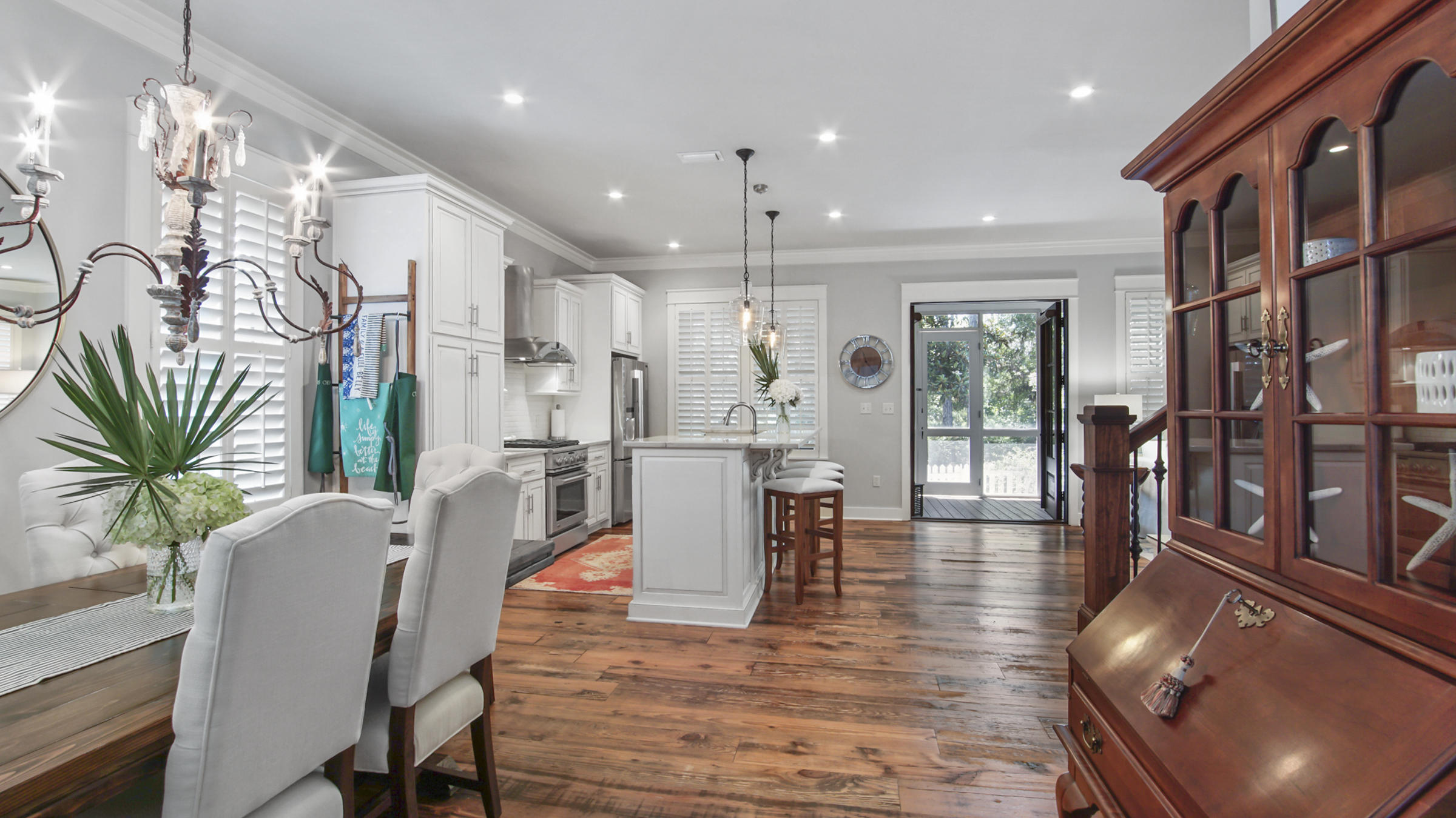 247 Artesian Way Watersound, FL 32461 - Photo 11 of 36 a dining room with furniture entryway and wooden floor