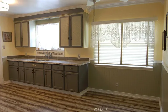 a bathroom with a sink and a window
