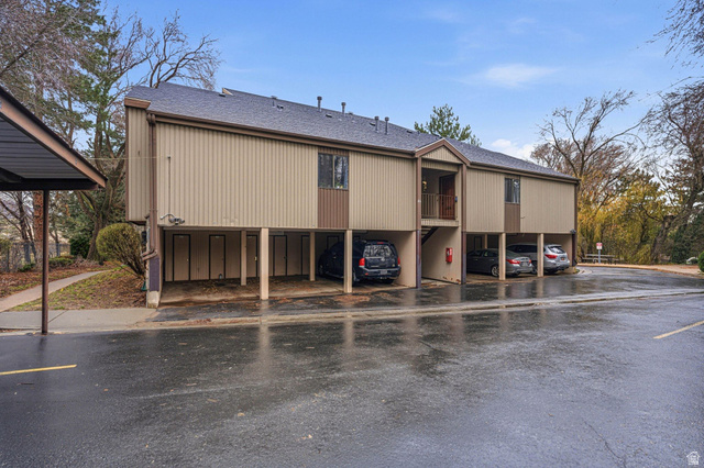 1175 Canyon Road, Unit 77 Ogden, UT 84404 - Photo 11 of 16 View of building exterior with covered parking