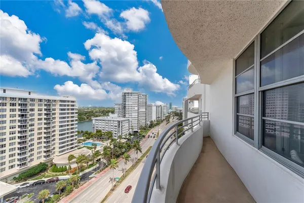 a view of a balcony with city view