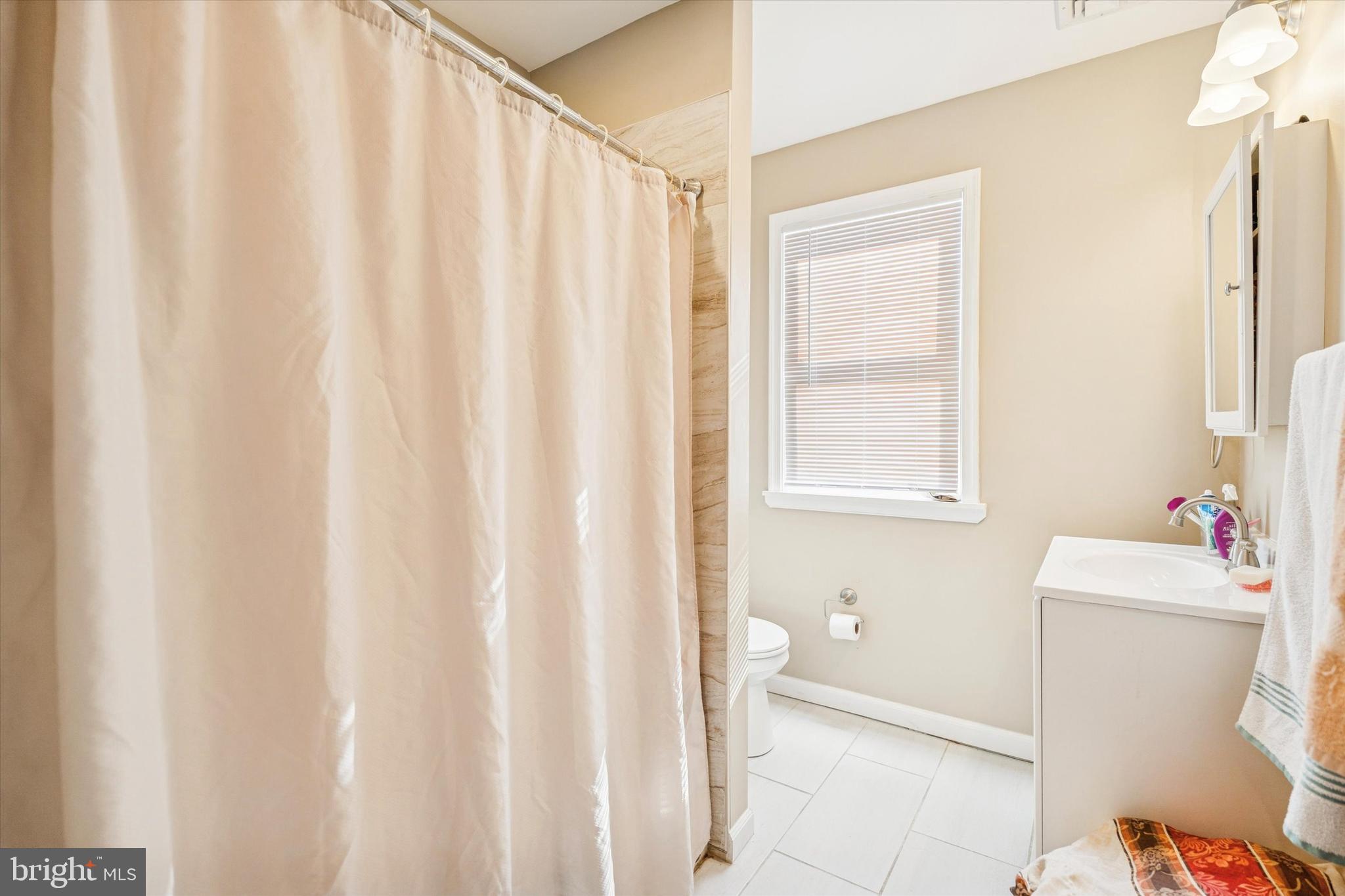 39 2nd Street Bridgeport, PA 19405 - Photo 12 of 23 Hall bathroom