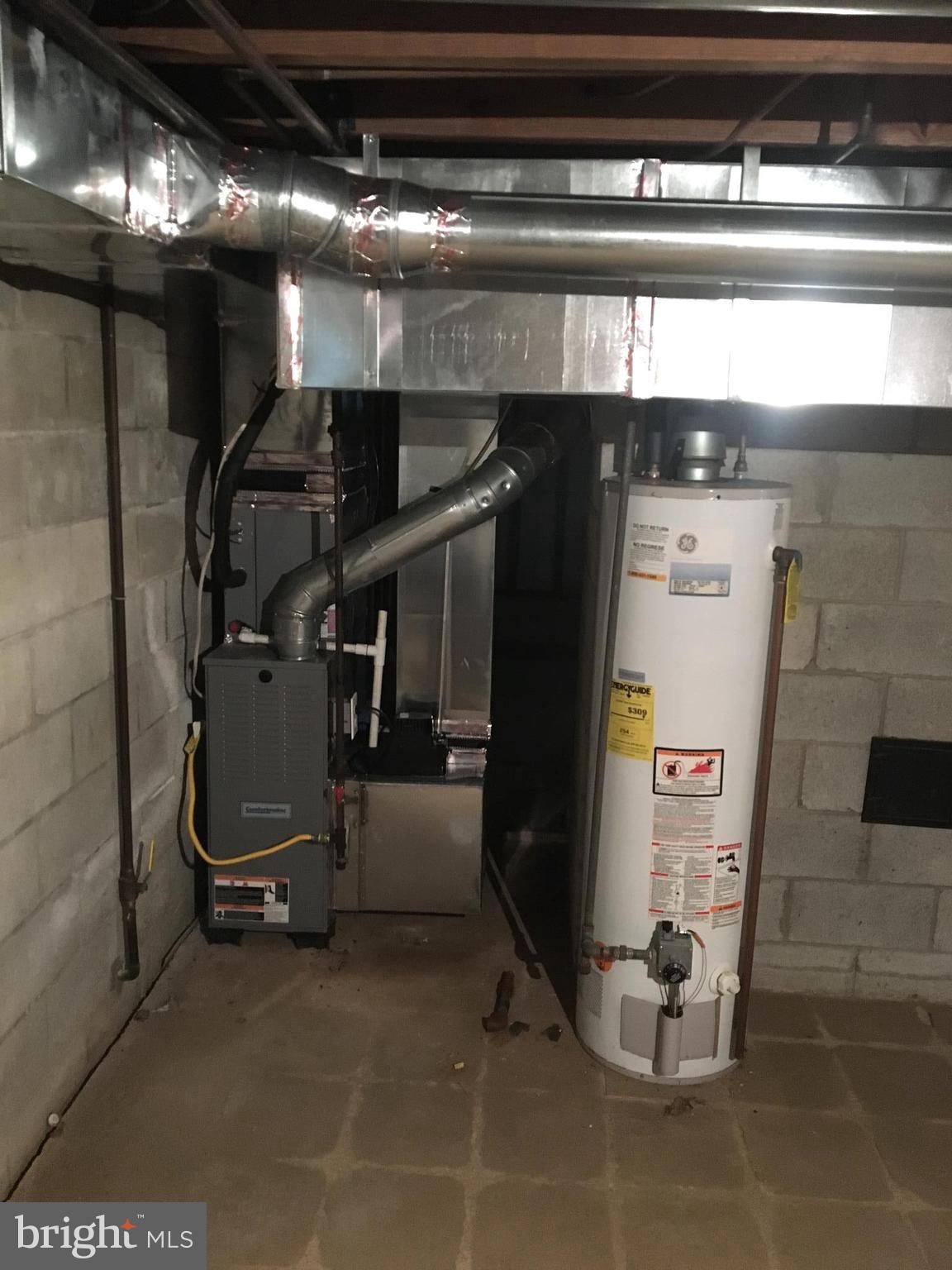 503 Shipley Road Linthicum Heights, MD 21090 - Photo 4 of 10 A/C Unit & Hot Water Tank