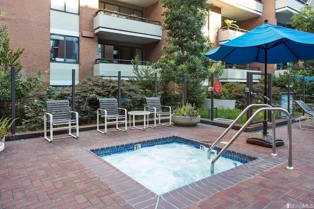 a view of dining room with furniture and window