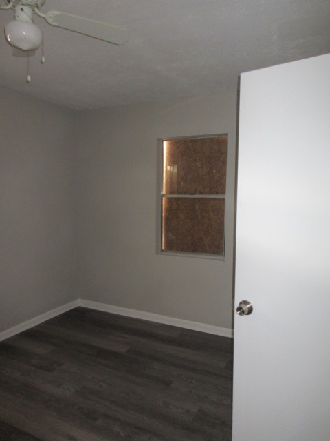 784 Terminal Court, Unit 11 Columbus, GA 31906 - Photo 12 of 23 a view of a small space with wooden floor and a window
