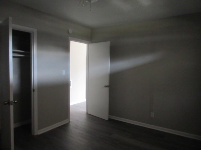 784 Terminal Court, Unit 11 Columbus, GA 31906 - Photo 15 of 23 an empty room with wooden floor & closet area