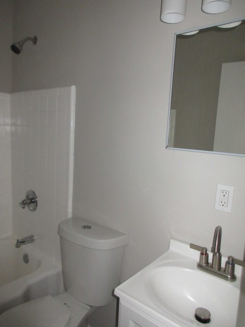 784 Terminal Court, Unit 11 Columbus, GA 31906 - Photo 18 of 23 a bathroom with a sink a toilet and shower