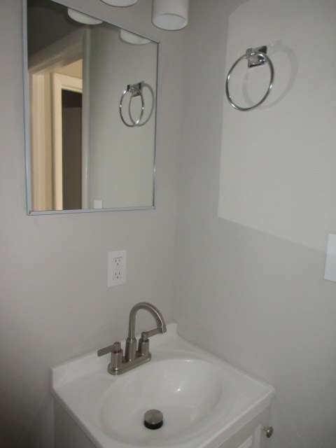 784 Terminal Court, Unit 11 Columbus, GA 31906 - Photo 19 of 23 a bathroom with a sink and mirror