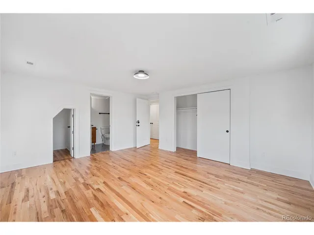 a big room with closet and bathroom