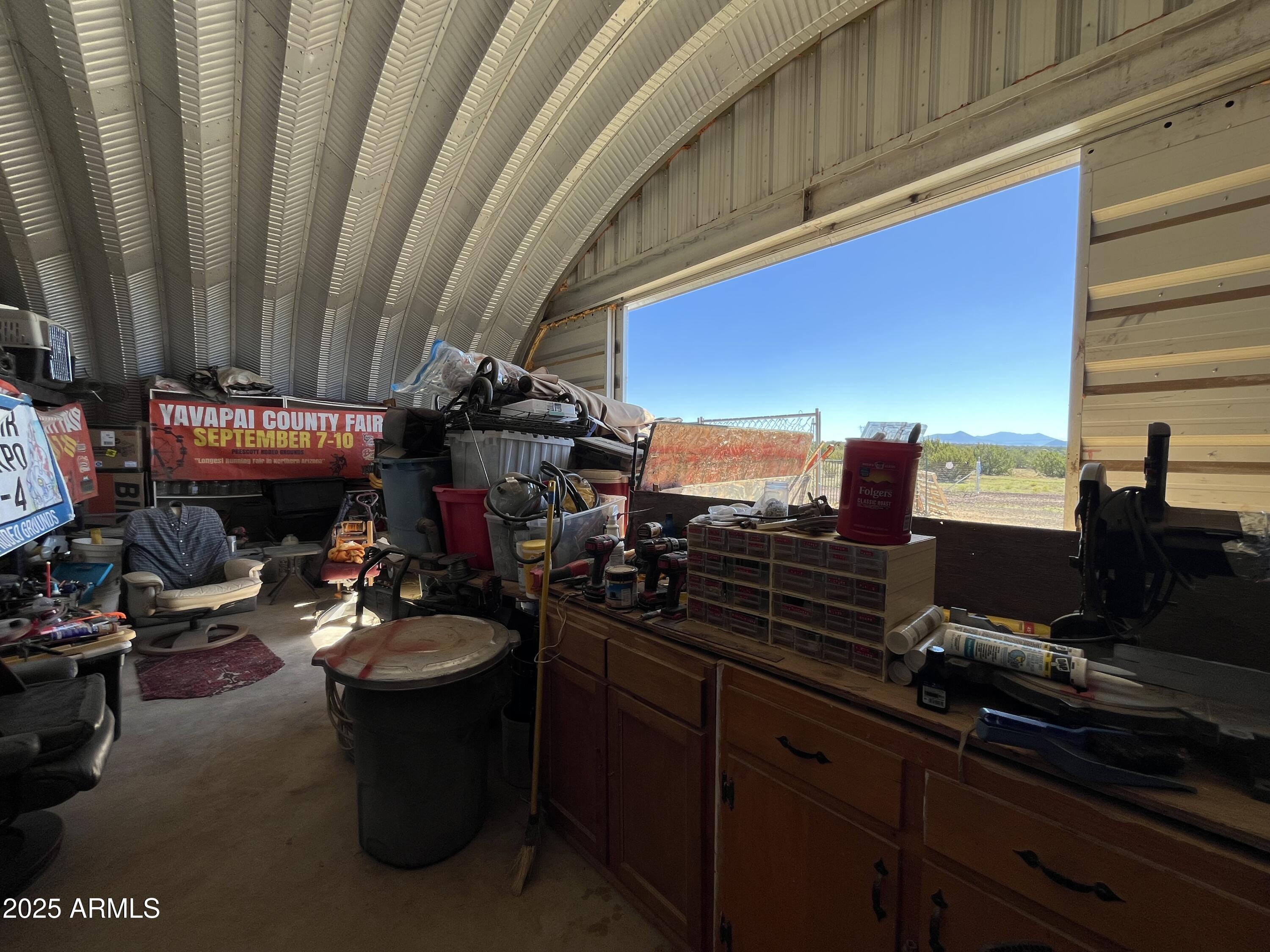 613 Mountain Cat Road, Unit 511 Williams, AZ 86046 - Photo 21 of 26 a view of a chairs and table in the balcony