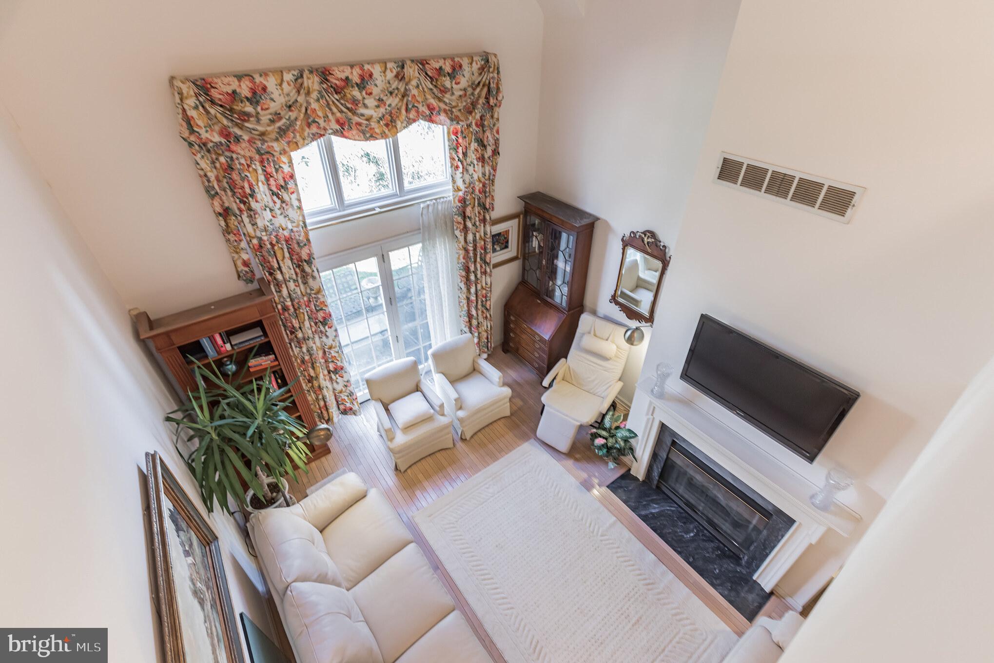10 Clwyd Road Bala Cynwyd, PA 19004 - Photo 12 of 26 LIVING ROOM W/FIREPLACE SHOT FROM SECOND FLOOR