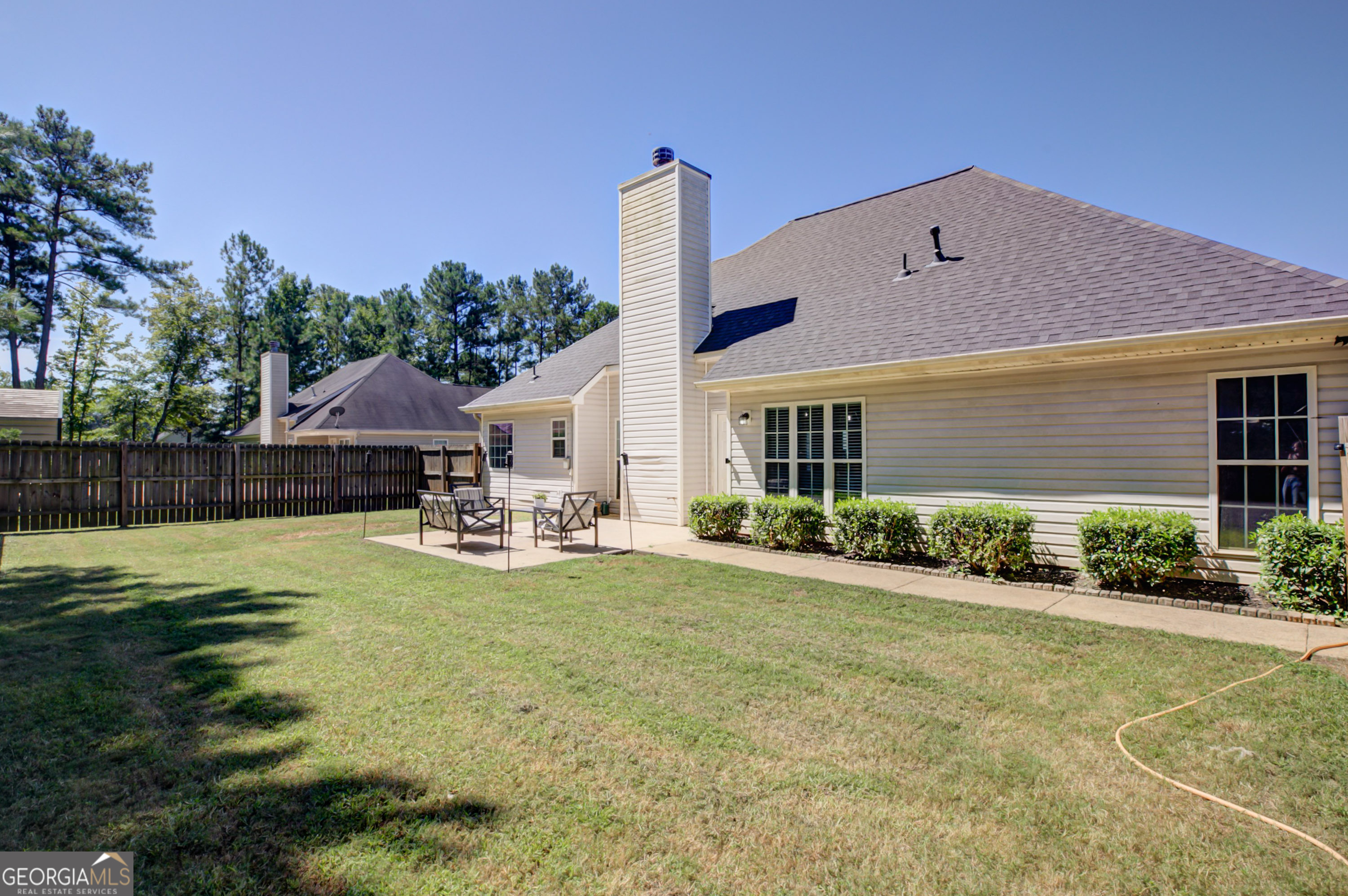229 John Lovelace Road LaGrange, GA 30241 - Photo 40 of 59 a front view of a house with swimming pool having outdoor seating