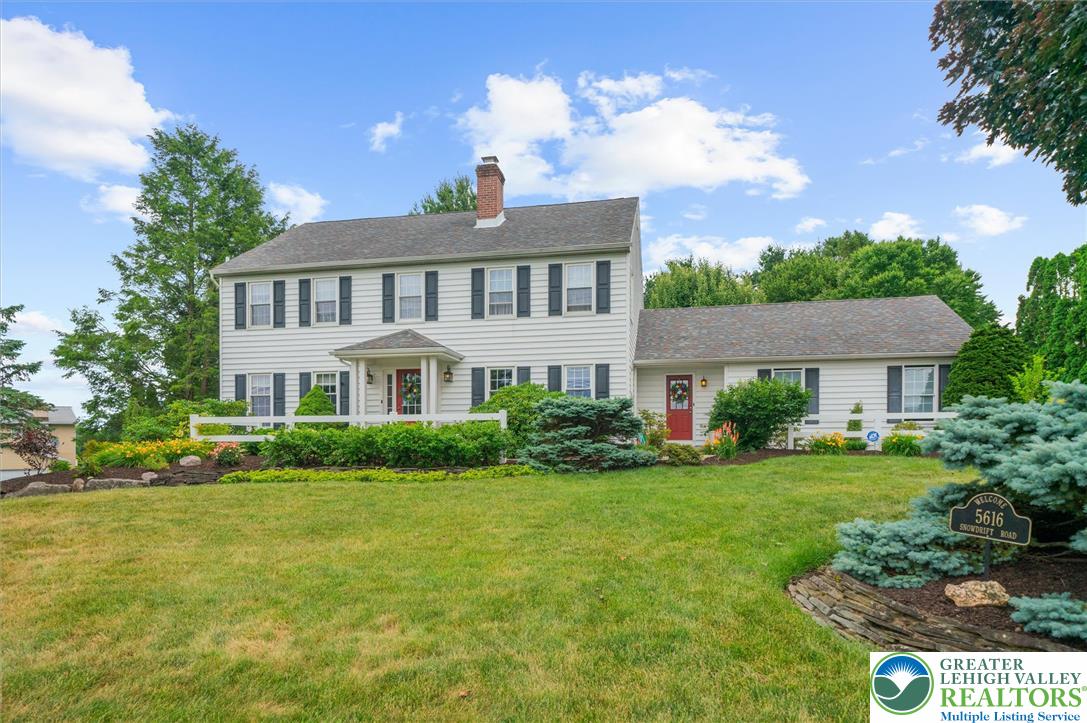 5616 Snowdrift Road Orefield, PA 18069 - Photo 1 of 36 A classic two-story residence with neat landscaping and a welcoming red front door.
