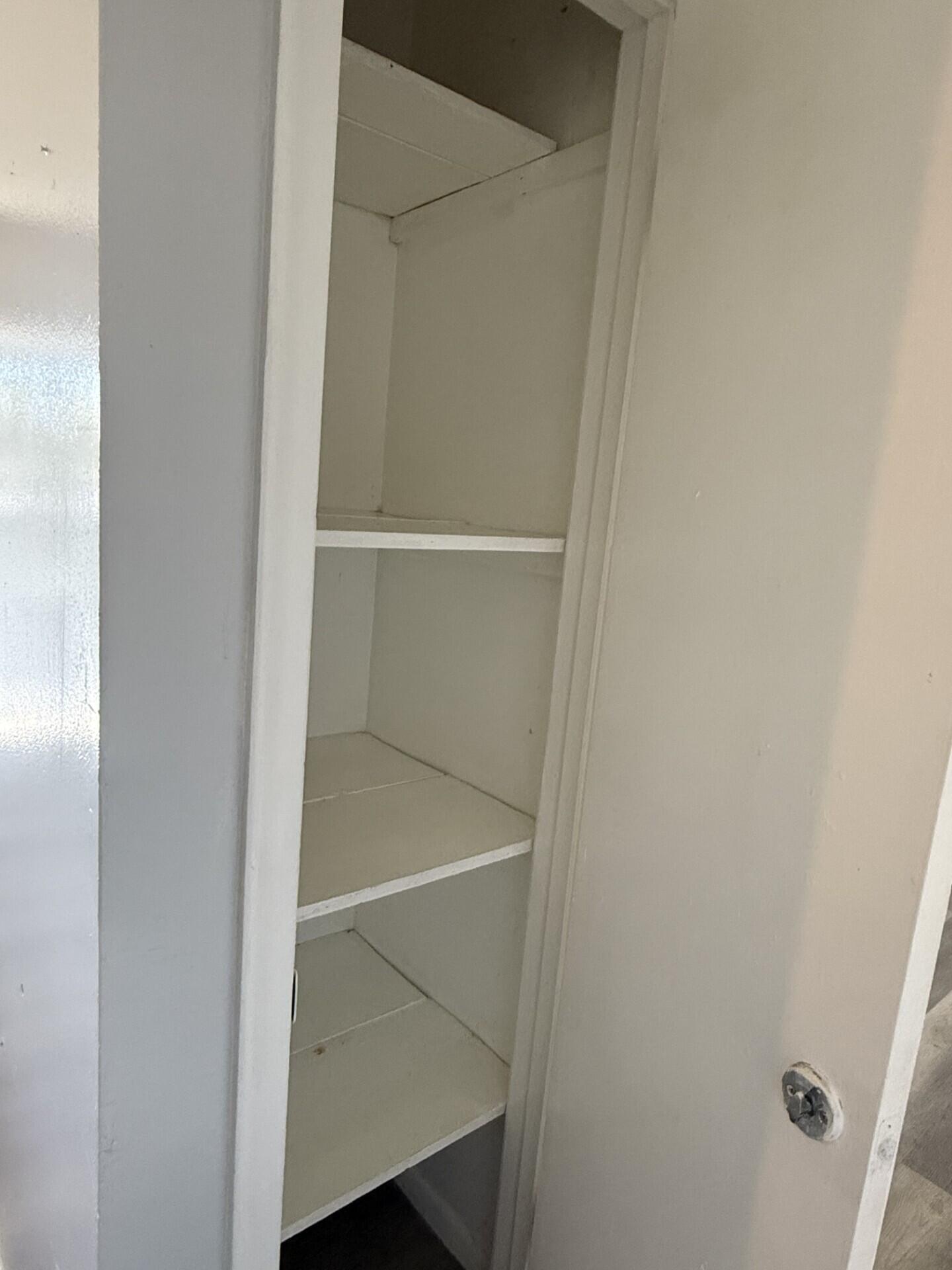 105 Southwest 5th Avenue, Unit D Boynton Beach, FL 33435 - Photo 6 of 8 a close view of closet