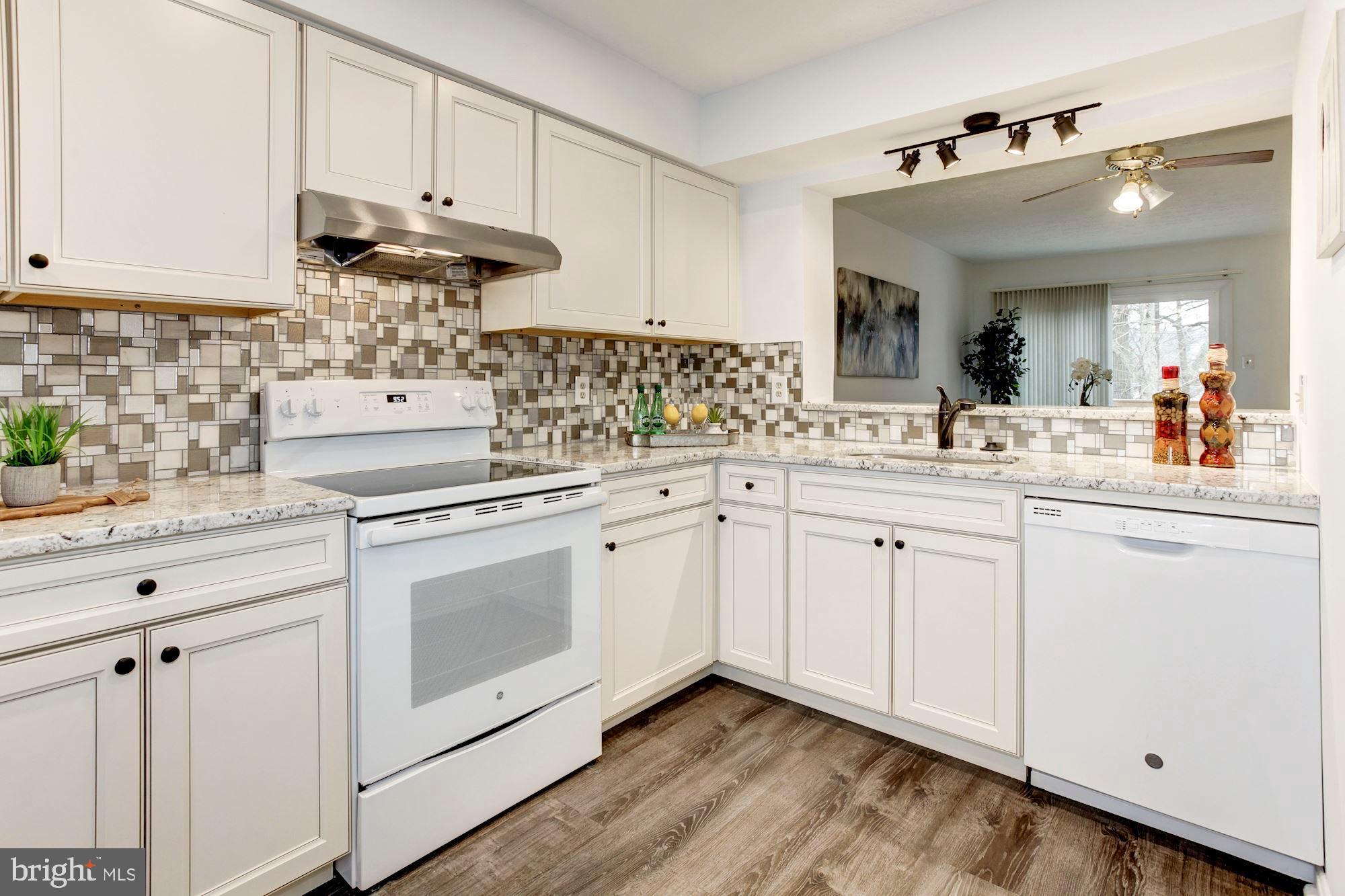 7340 Stream Way Springfield, VA 22152 - Photo 6 of 32 Gorgeous tile backsplash.