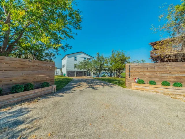 an aerial view of residential house with outdoor space