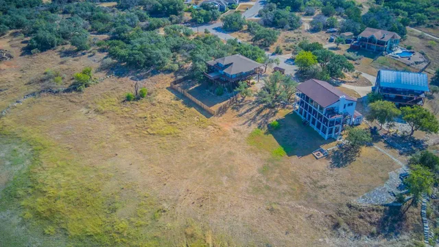 a view of a balcony with wooden floor