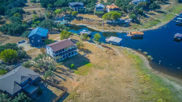 a view of a porch with wooden floor