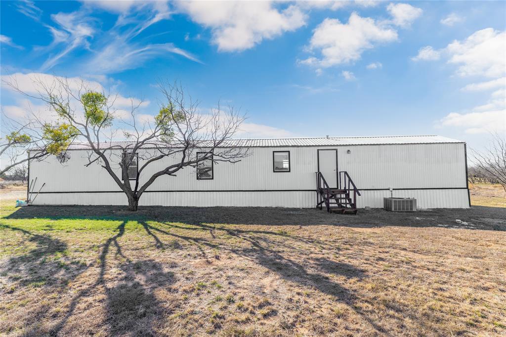 3393 Doe Trail Road Brownwood, TX 76801 - Photo 22 of 29 a view of a backyard