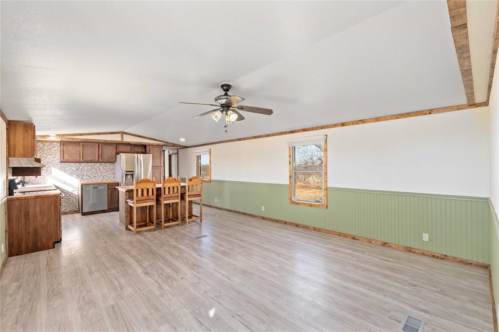 3393 Doe Trail Road Brownwood, TX 76801 - Photo 4 of 29 a view of a livingroom with furniture and wooden floor