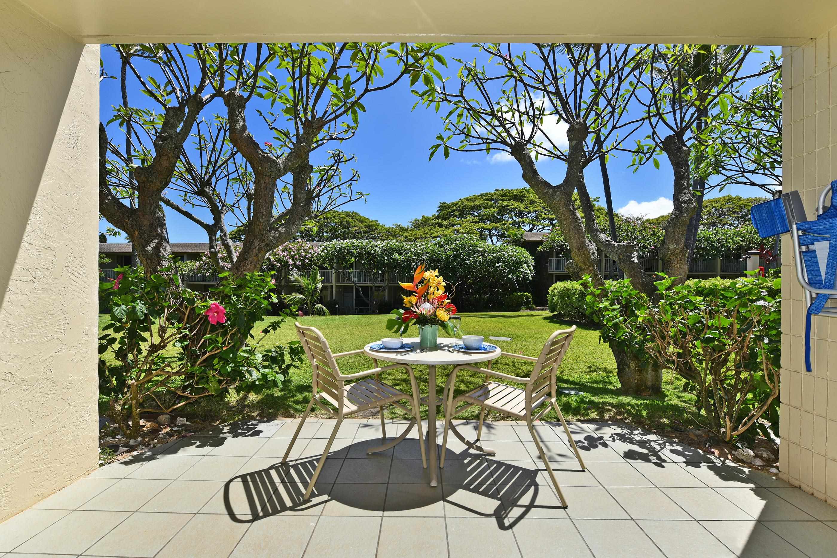 5315 Lower Honoapiilani Road, Unit F147 Lahaina, HI 96761 - Photo 2 of 41 a view of a table and chairs in patio