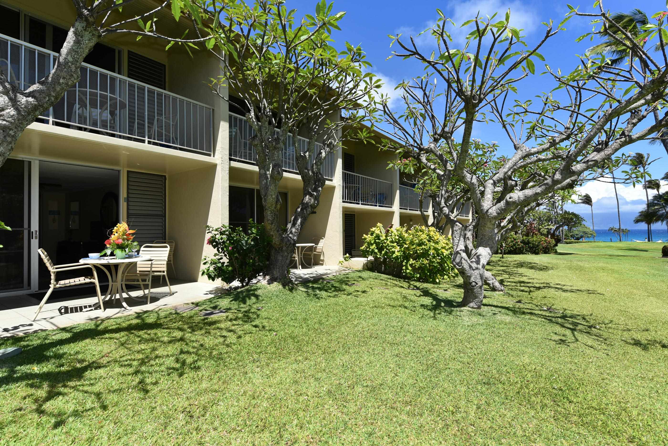 5315 Lower Honoapiilani Road, Unit F147 Lahaina, HI 96761 - Photo 3 of 41 a view of a house with backyard porch and sitting area
