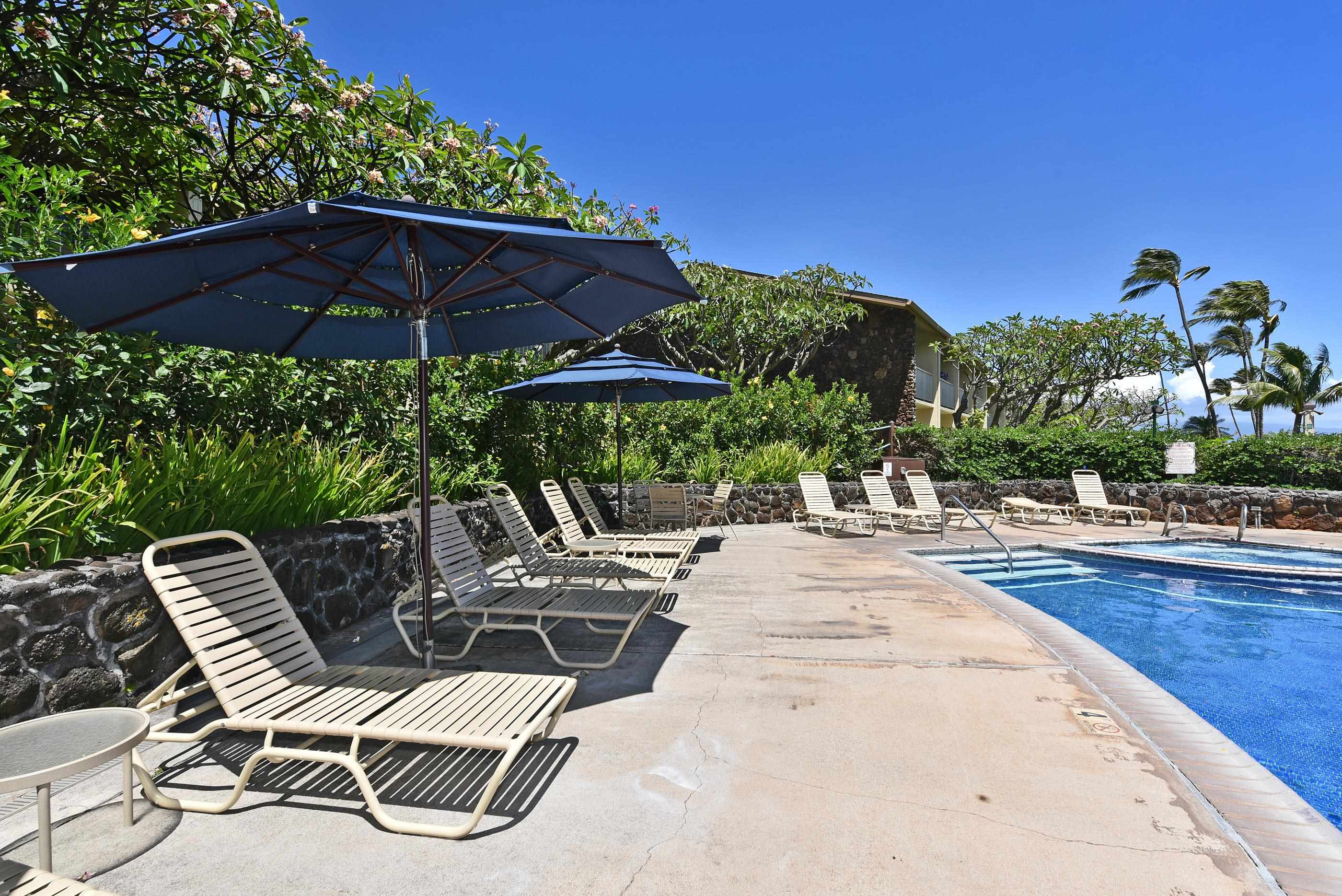 5315 Lower Honoapiilani Road, Unit F147 Lahaina, HI 96761 - Photo 31 of 41 a view of a backyard with sitting area