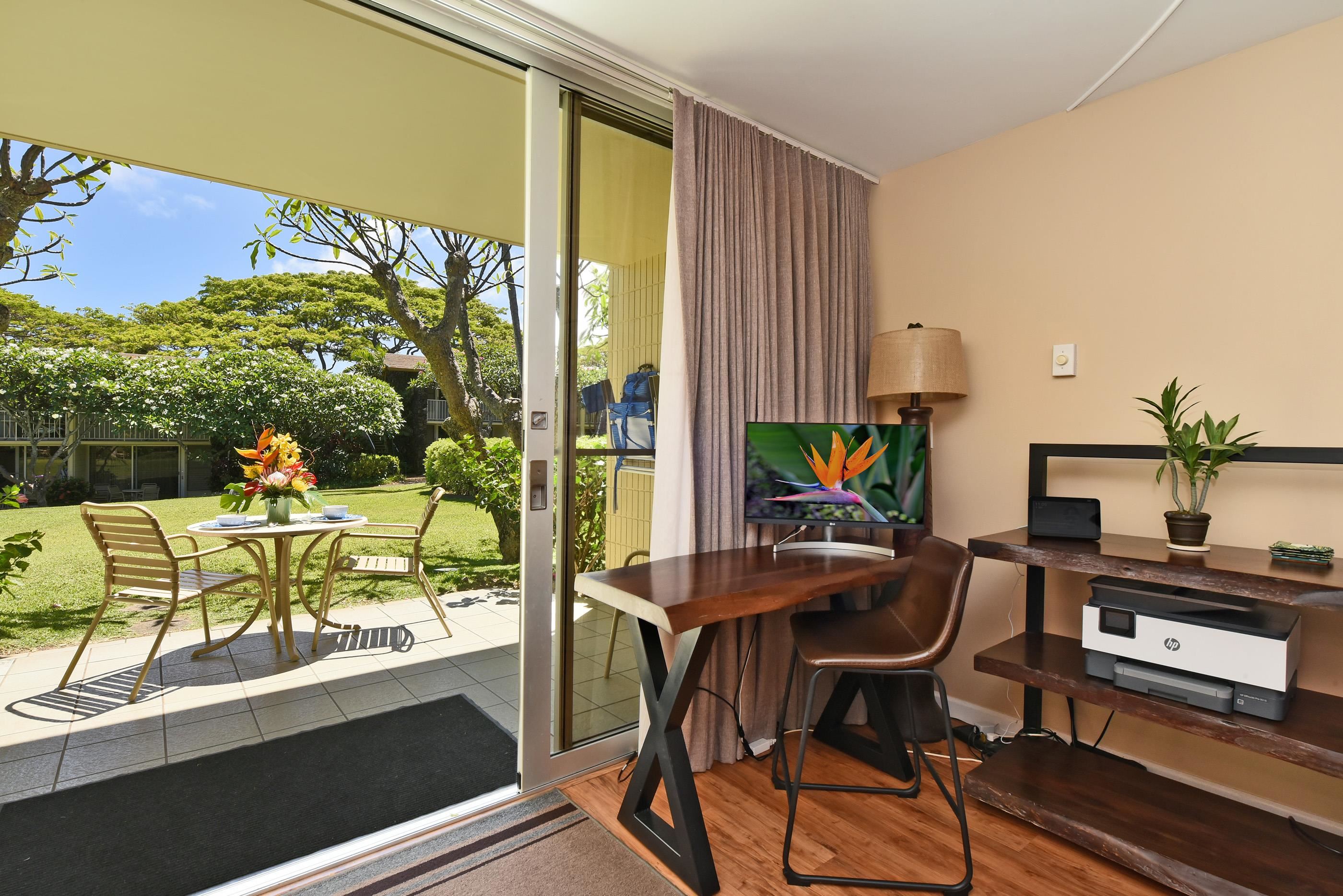 5315 Lower Honoapiilani Road, Unit F147 Lahaina, HI 96761 - Photo 8 of 41 a view of a chairs and table in patio