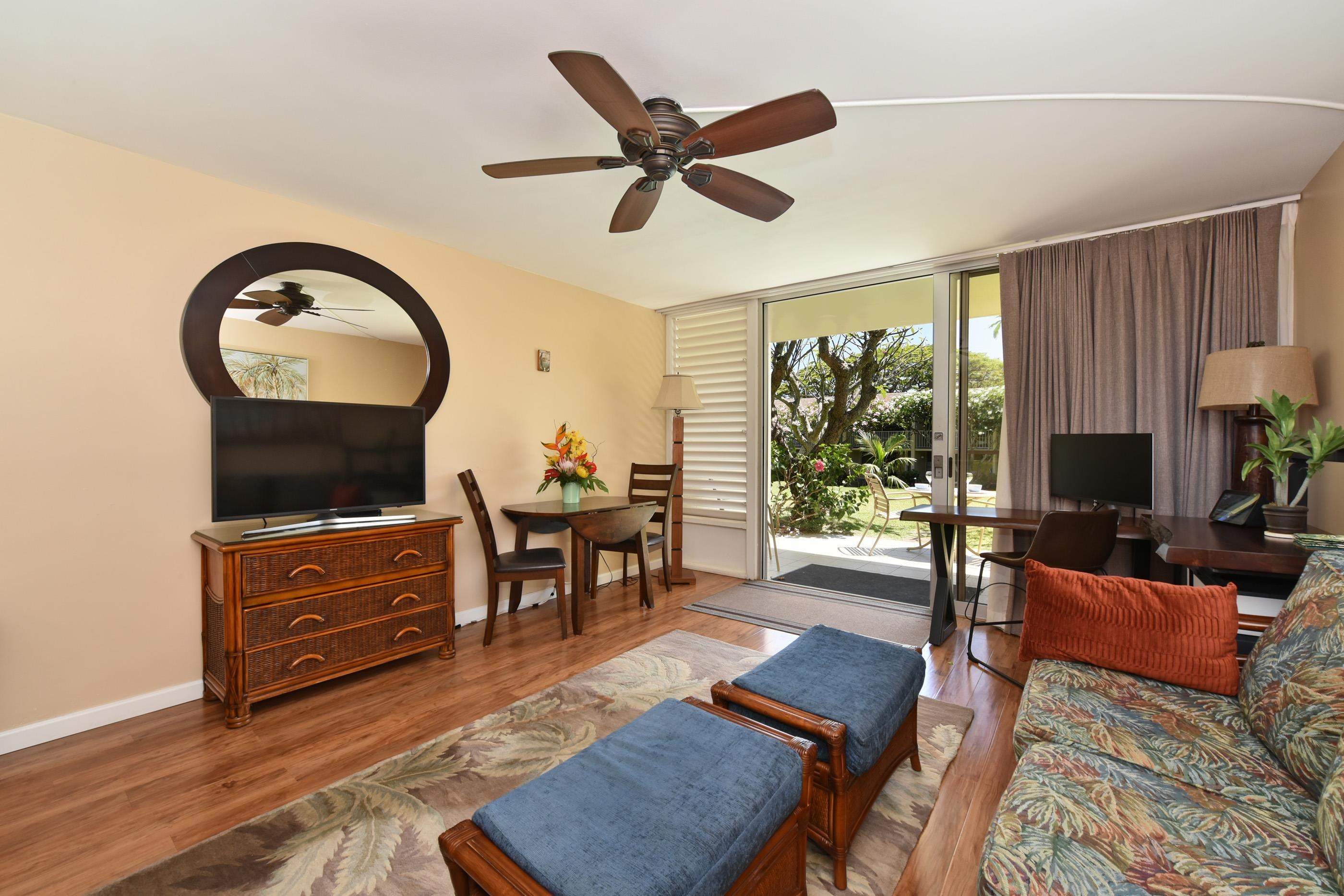 5315 Lower Honoapiilani Road, Unit F147 Lahaina, HI 96761 - Photo 9 of 41 a living room with furniture and a window