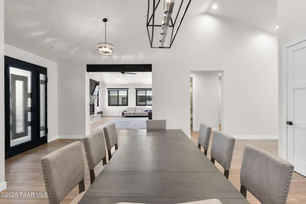 a view of a livingroom with furniture and windows