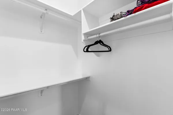 a close view of light fixtures and closet