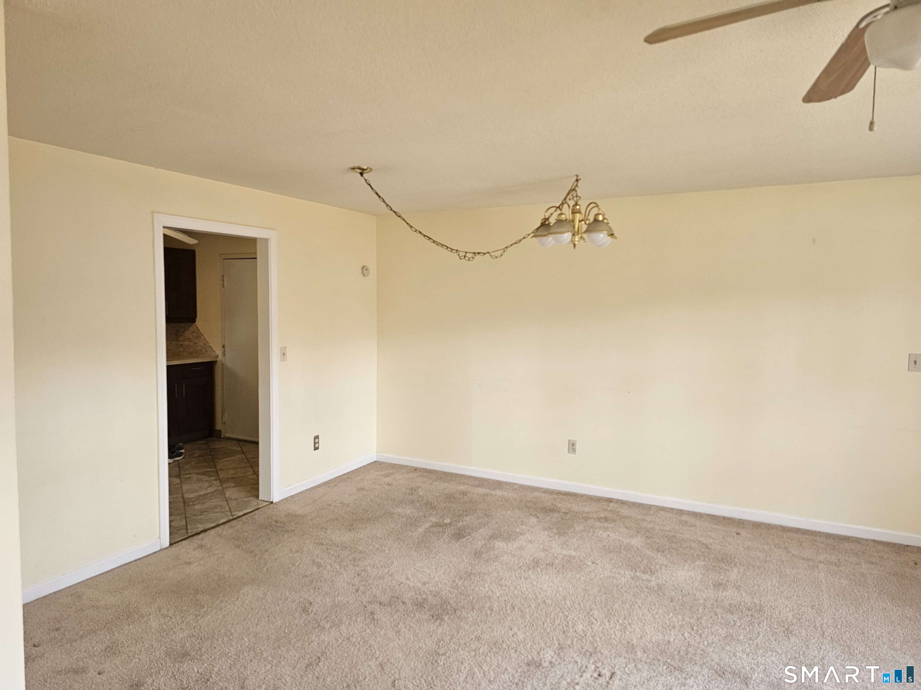 Undisclosed Address Cheshire, CT 06410 - Photo 4 of 12 a view of a room with an empty space
