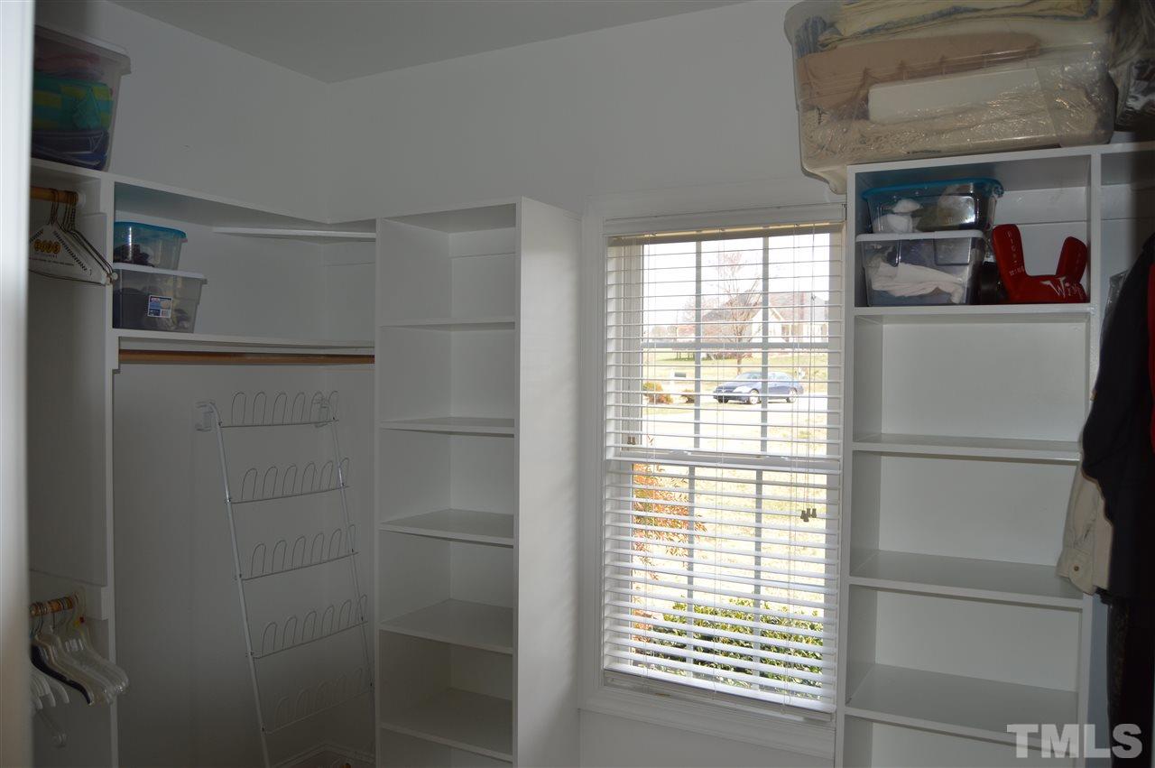 1069 Wheeler Pond Road Creedmoor, NC 27522 - Photo 13 of 22 a kitchen with a refrigerator and window